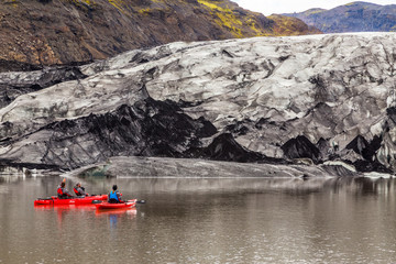 Kayaks on trip around glacier, Iceland