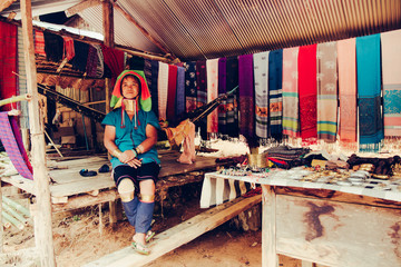 Fototapeta premium Long Neck Woman wearing at traditional costume. Tribal village Thailand.