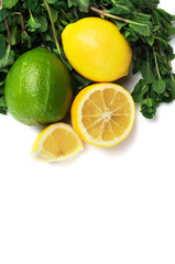 fresh lime, lemon and mint isolated on white