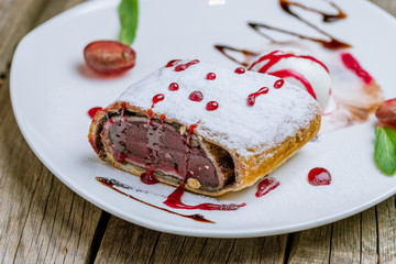 Cherry strudel with ice cream
