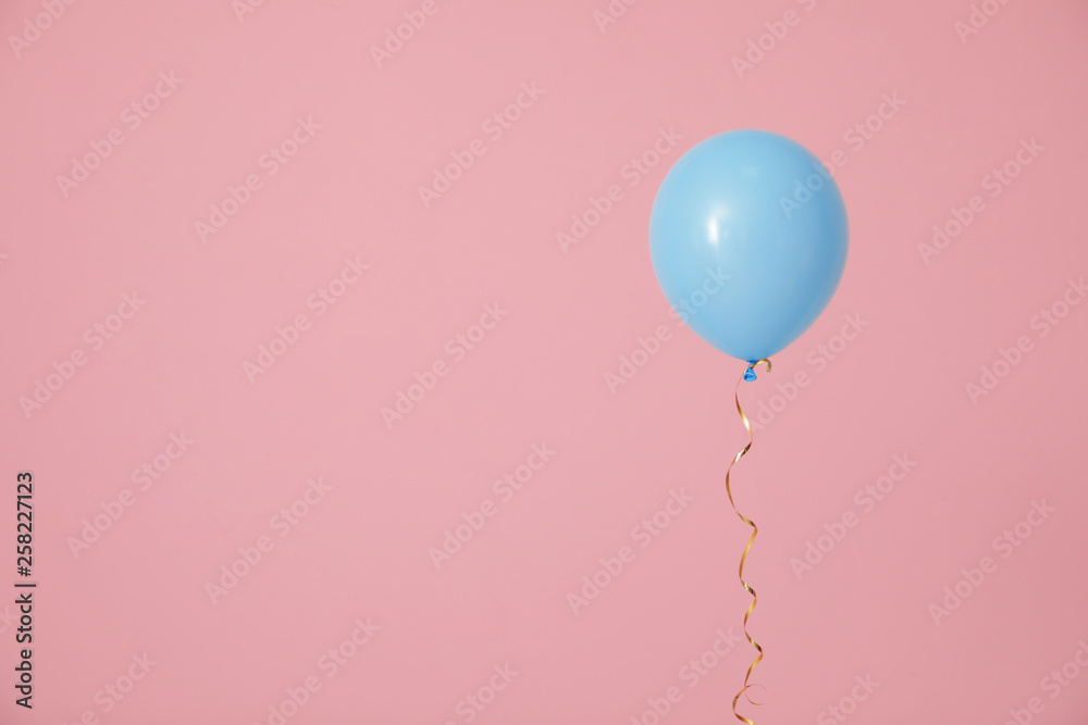 Poster Bright balloon on color background, space for text. Celebration time