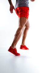 Mans figure wearing red shorts performing running movements