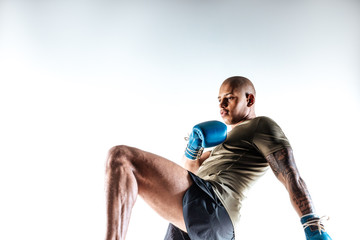 Man doing fighting movements with arms and legs