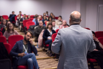 successful businessman giving presentations at conference room