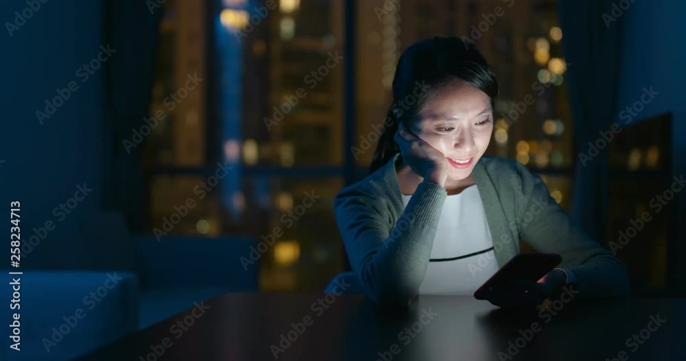 Canvas Prints Woman use of mobile phone at home