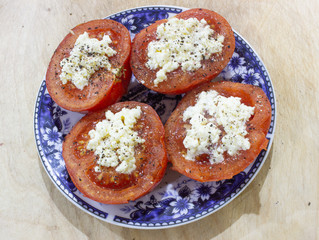 Red tomatoes on a plate