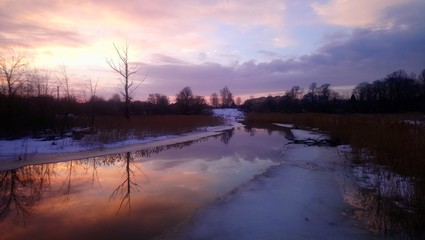 Obraz premium sunset over the river, in russia
