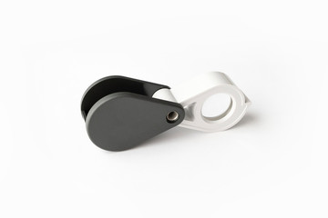 Magnifying glass for diamonds or see the amulet Isolated on a White Background.
