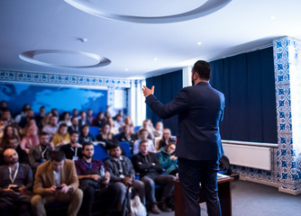 successful businessman giving presentations at conference room