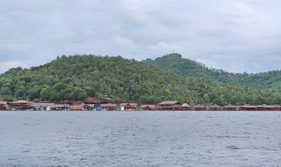 Raft House floating on the river with mountain at kanchanaburi, Resort in thailand.