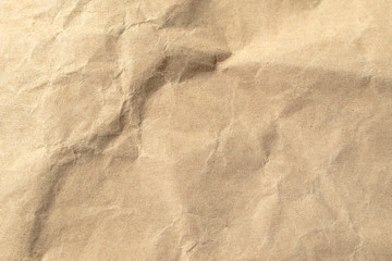 Brown crumpled paper texture background.