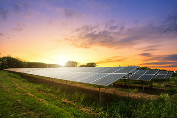 Solar panel on dramatic sunset sky background, Alternative energy concept