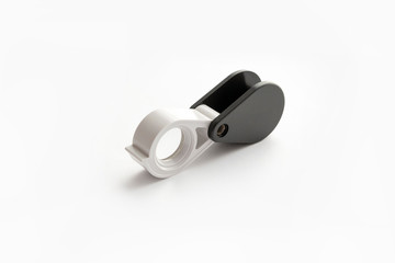 Magnifying glass for diamonds or see the amulet Isolated on a White Background.
