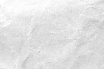 Obraz premium White crumpled paper texture background. Close-up.