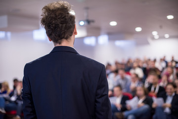 successful businessman giving presentations at conference room