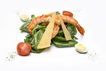 Caesar salad with shrimp isolated on white background