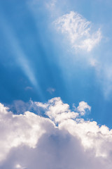 Beautiful blue sky and clouds. Sun rays