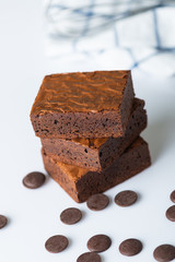 Close up sweet chocolate brownie on white background