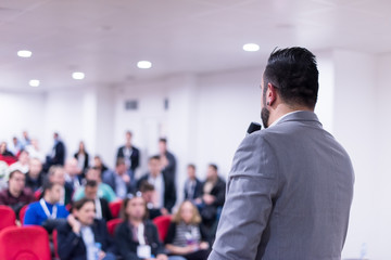 successful businessman giving presentations at conference room
