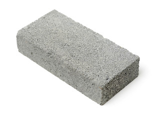 Gray cement solid brick isolated on a white background 