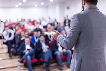 successful businessman giving presentations at conference room