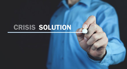 Man writing in screen. Crisis-Solution