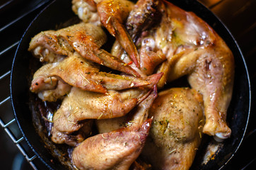 Fried chicken from the oven. Chicken wings, legs grilled