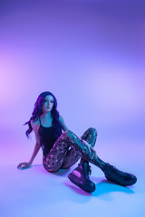 Beauty Rainbow woman silhouette. Neon profile portrait of young woman  in a black underwear and  body