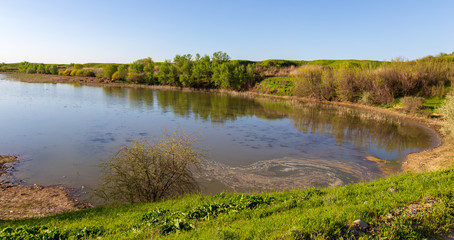 Pond in spring steppe as background
