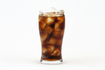 Cola in glass with ice on white background