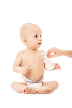 Mom Wiping Baby's Bottom With Baby Wipe Isolated On A White Background. Concept Cleaning Wipe, Pure, Clean