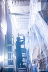 Paint shop and lighting in the large trucks and passenger cars are painted and also repaired