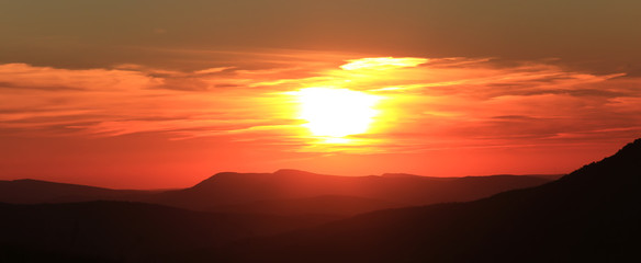 red sunset in the mountains