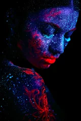Wall murals Female Profile portrait of a beautiful girl alien. Ultraviolet body art blue night sky with stars and pink jellyfish