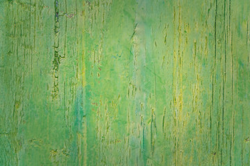 Fototapeta premium Green vintage wood background texture with knots, old paint and nail holes