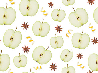 Seamless pattern Slides of Apple, star anise and lemon peel on white isolated background.