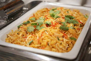 Pudthai in a tray on buffet table
