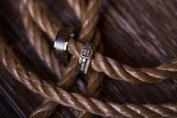 Wedding rings on brown rope