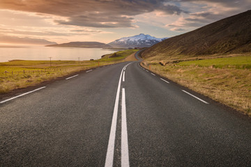 Empty road in north Iceland at sunset