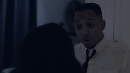 African couple fighting in kitchen late at night CU man