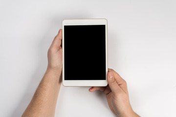 Man working with tablet, top view