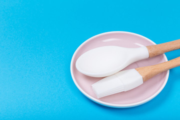 kitchen utensils on blue background