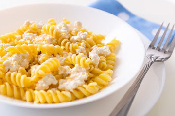 Homemade macaroni and white cottage cheese and sugar for kids