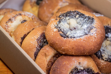 Sweet tastefull traditional cakes with jam, fruit, cottage cheese and poppy seeds.