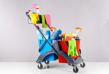Set of cleaning supplies on light background