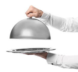 Waiter with tray and cloche on white background