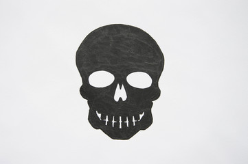 Hand painted black skull on white background