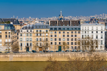 Paris, view of ile Saint-Louis, panorama of the roofs and houses with view on the Seine