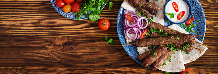 Turkish and Arabic Traditional Ramadan mix kebab plate. Kebab adana, chicken, lamb and beef on...