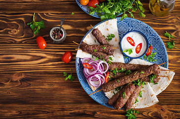 Turkish and Arabic Traditional Ramadan mix kebab plate. Kebab adana, chicken, lamb and beef on...